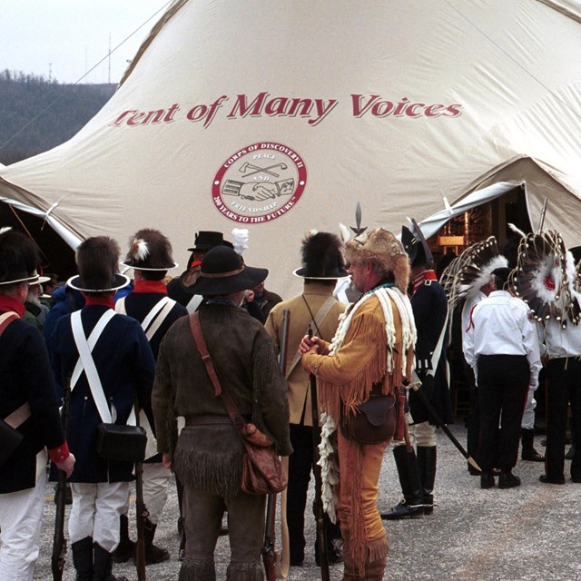 a gorup of people in 1800s clothing