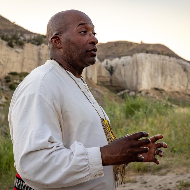 a man wearing 1800s clothing 