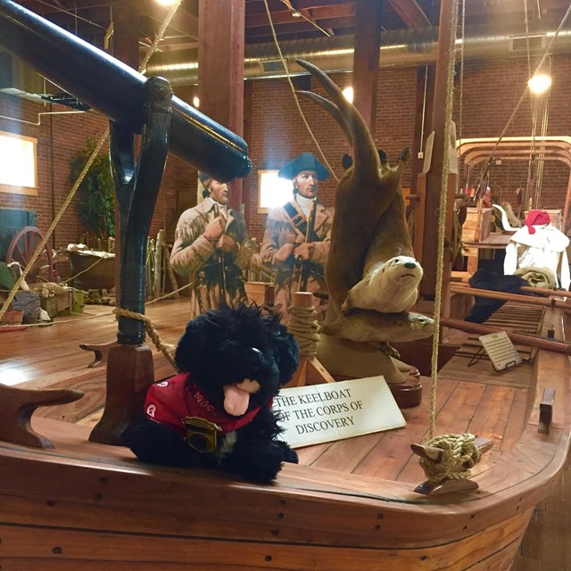 toy dog on keelboat