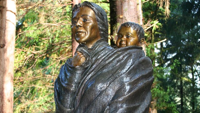 A bronze statue of Sacagawea and their son Jean Baptiste