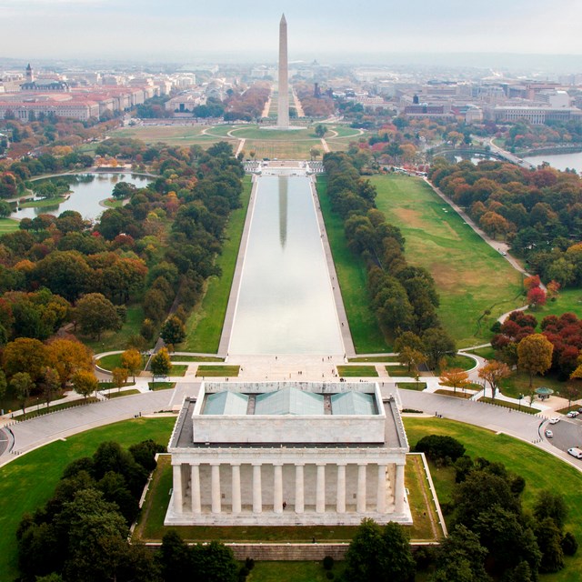 Aerial photo of the Lincoln Memorial, Reflecting Pool, and Washington Monument.