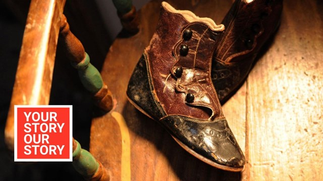 An old leather boot on a wooden chair