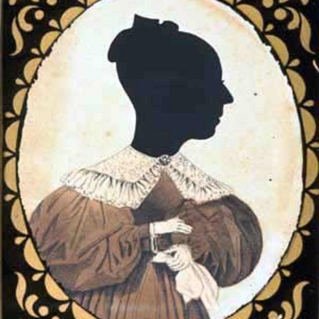 A silouette of a woman in a frame