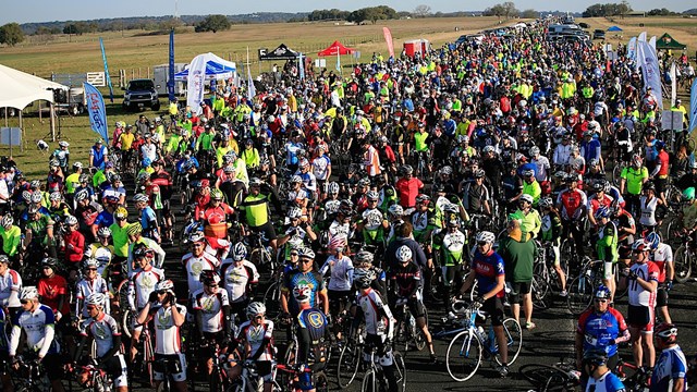 Thousands of cyclists que up at the startline of the LBJ 100 Bike Ride.