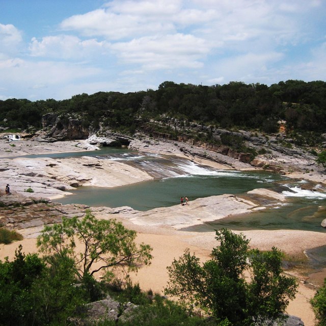 Pedernales River running over limestone