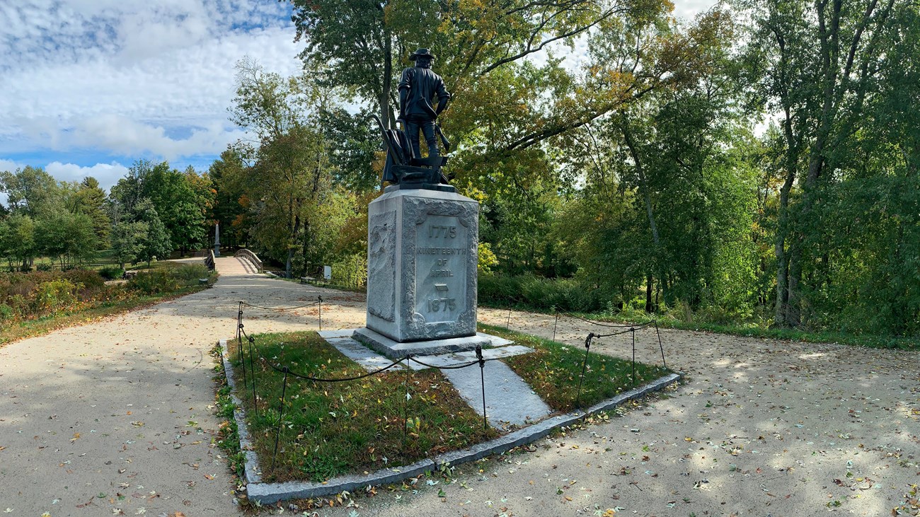 North Bridge timbers silhouetted against the sunset reflecting in the water.