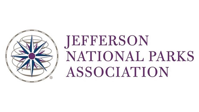 The words Jefferson National Parks Association next to a blue, white and purple colored star
