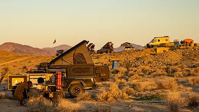 Jeeps with roof-top tents camping