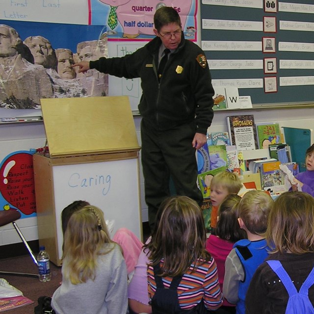 A Mount Rushmore park ranger visiting a local classroom.