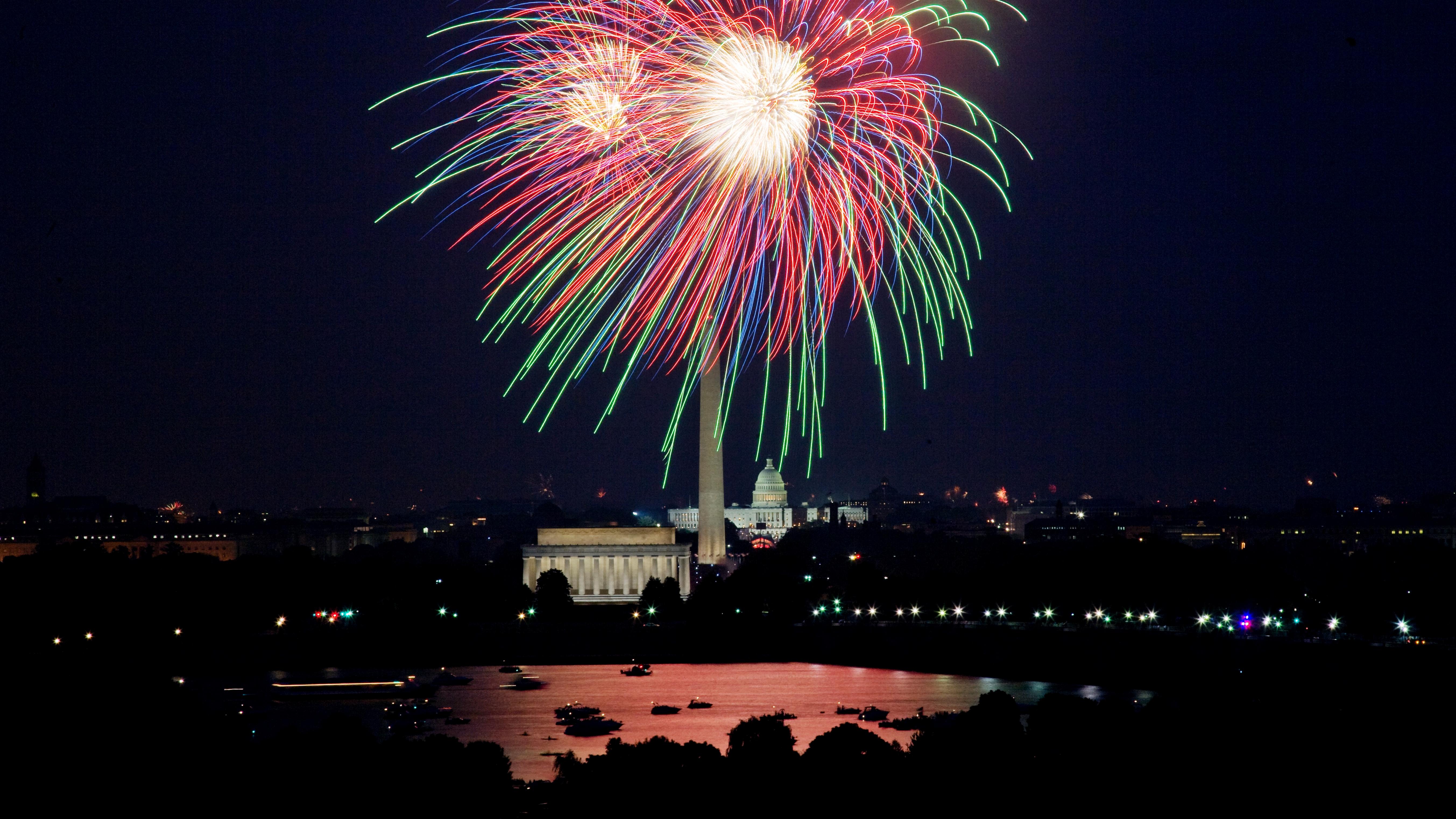 Colorful fireworks over DC memorials