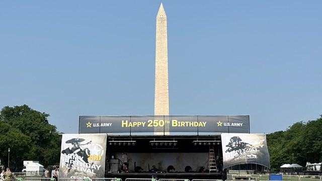 Large stage with Washington Monument in the distance