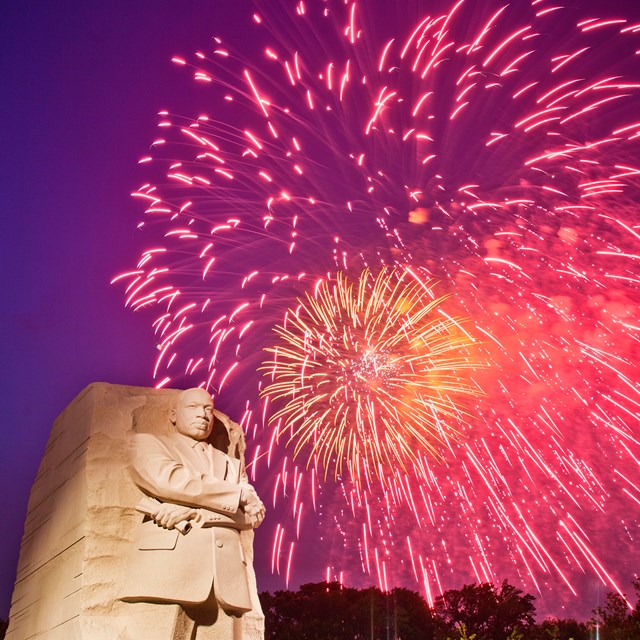 Fireworks going off behind the Martin Luther King, Jr. Memorial