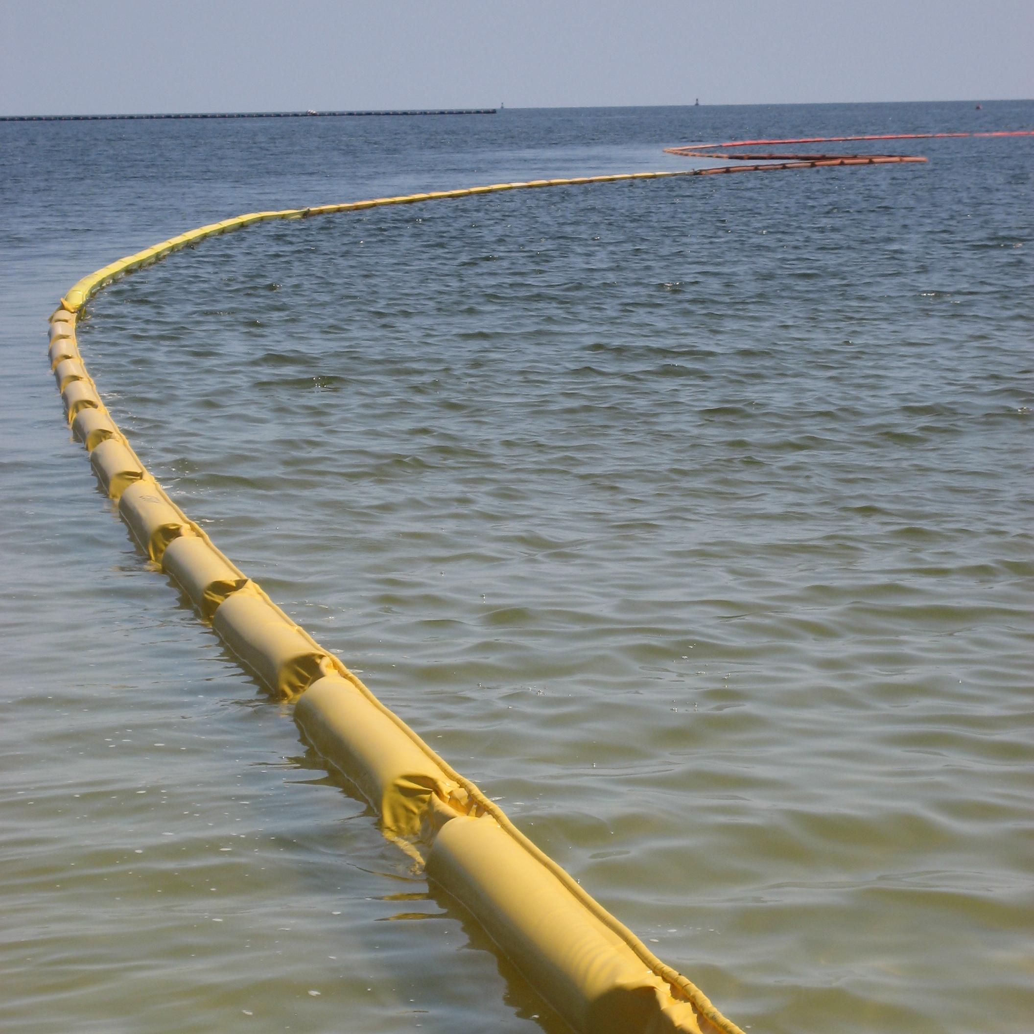 A boom is deployed during spill response on the ocean.