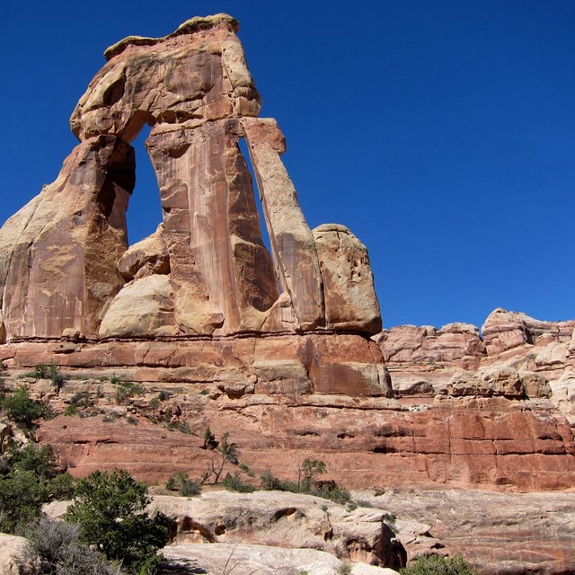 Red rock formation against brilliant blue sky