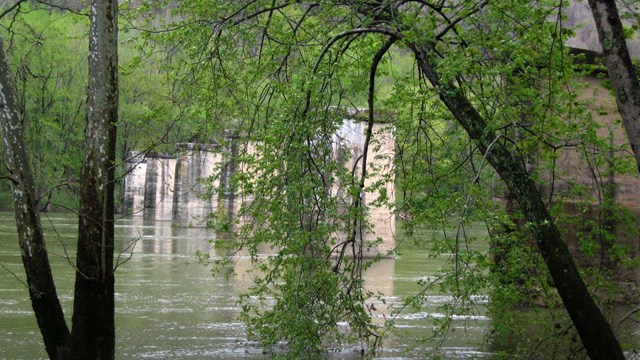 bridge piers crossing a wide river