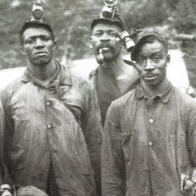 black and white photo of African American coal miners