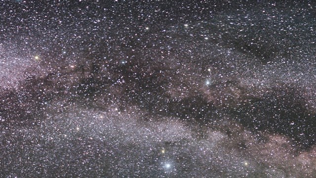 Cropped night sky view of the Milky Way and constellations
