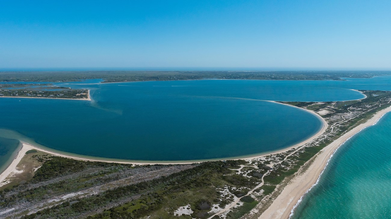 Aerial view of barrier beach in the ocean