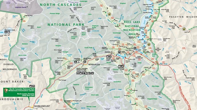 A map showing the boundary of North Cascades National Park and the trails and highlights in the area