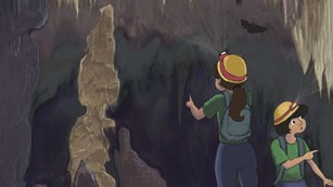 Illustration of two kids with flashlights in a cave