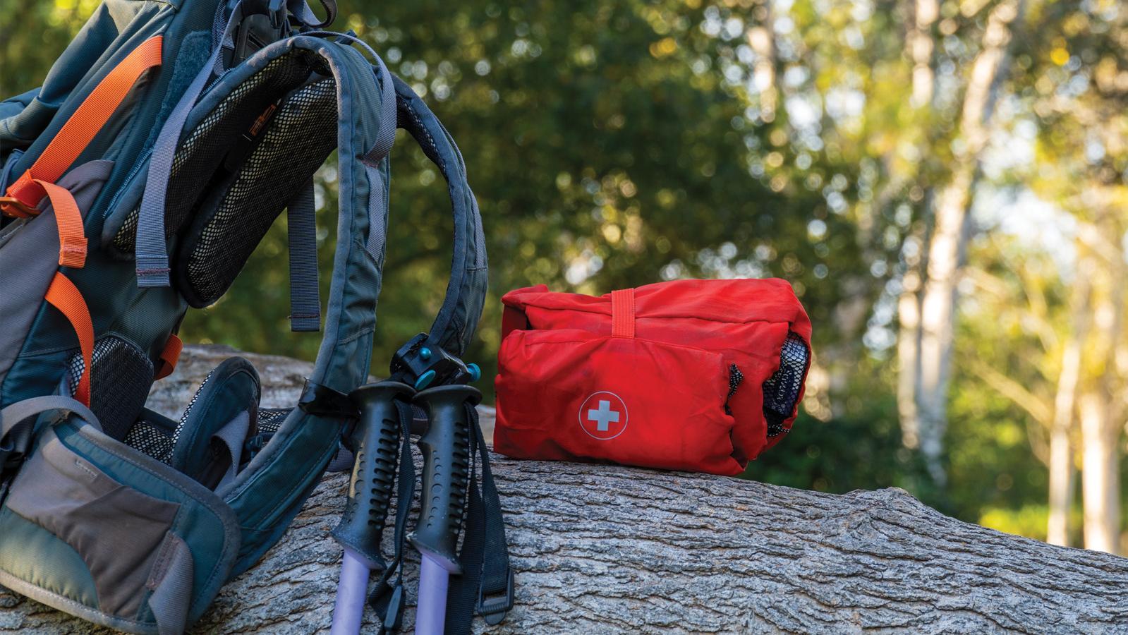 Hiking backpack, first aid kit.