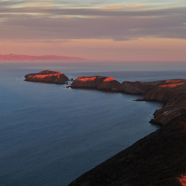 aerial photograph of the islets of Anacapa during sunset