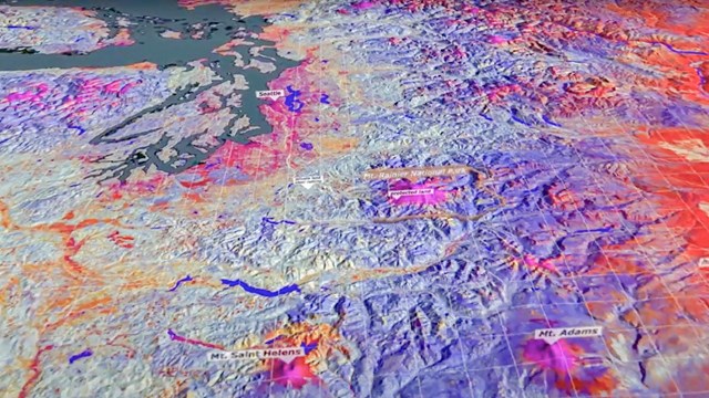 A colorful map of the Pacific Northwest using non-visible wavelengths taken from a satellite.