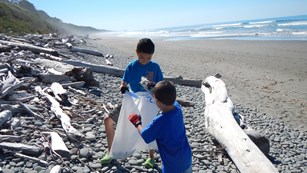 Kids collecting marine debris