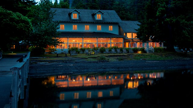 Lake Crescent Lodge glows upon an evening lake.