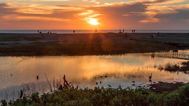Sunset over Rodeo Lagoon and wetlands.