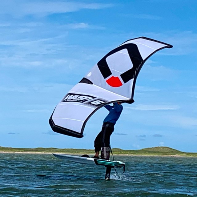 A person windsurfing