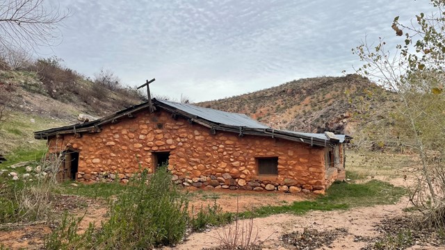 View of Tassi Ranch, including the historic homestead with rock facade. 