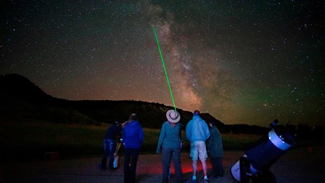 Ranger uses a laser pointer to highlight stars in the sky.
