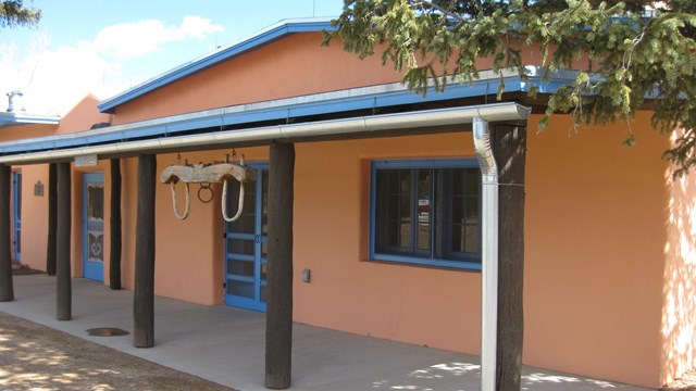 Orange front porch of historic Trading Post building