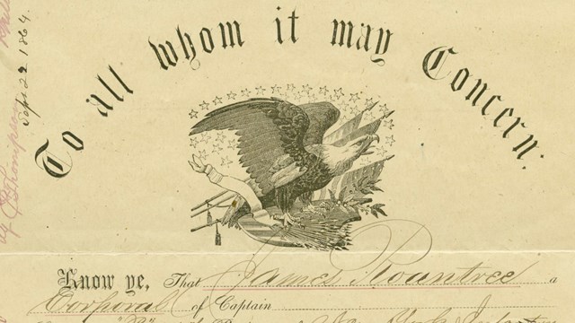 Discharge document text at top reads "To all whom it may concern" More cursive text benth.