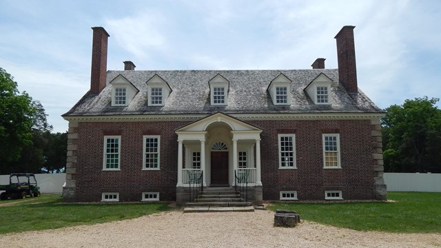 Historic brick house with four chimneys 