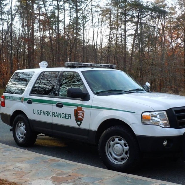 Law Enforcement vehicle in the circle of the Visitor Center