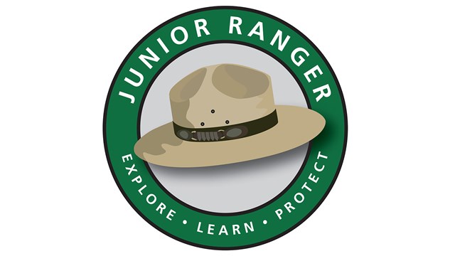 Junior Ranger seal that reads Explore, Learn, Protect