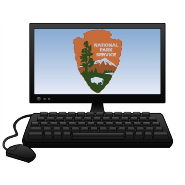 a National Park Service arrowhead on a computer screen