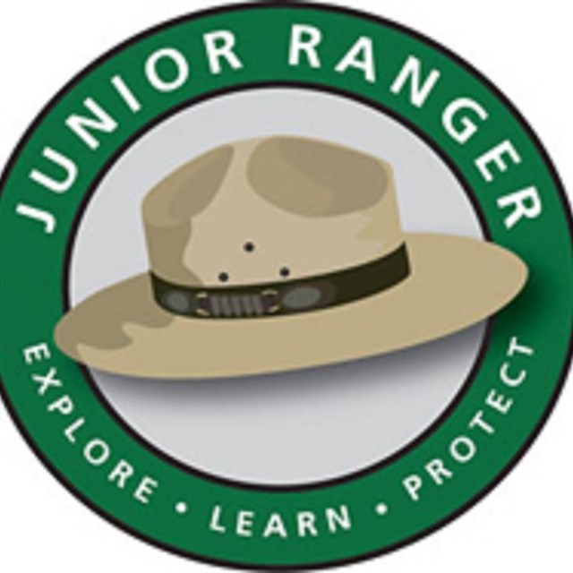 A drawing of a park ranger hat and the text 