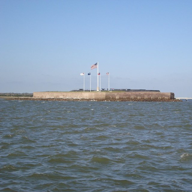 Fort Sumter's right flank and gorge wall as seen from a boat. 