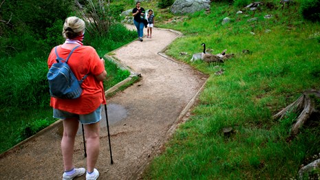Visitor walking on a hiking trail