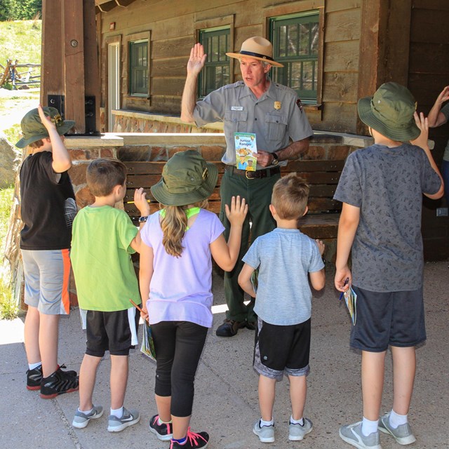 A group of Junior Rangers are being sworn in at Hidden Valley