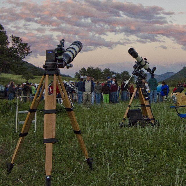 Telescopes are set up for a night sky program