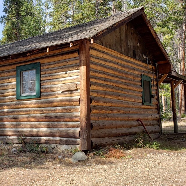 An old wooden cabin, the Columbine Cabin, at the Holzwarth Historic Site