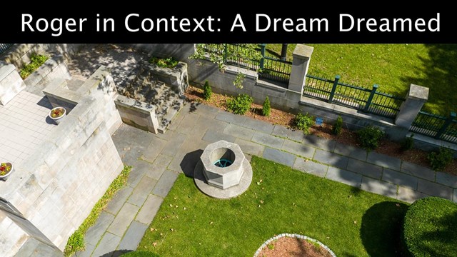 Arial view of a formal garden with grey historical well