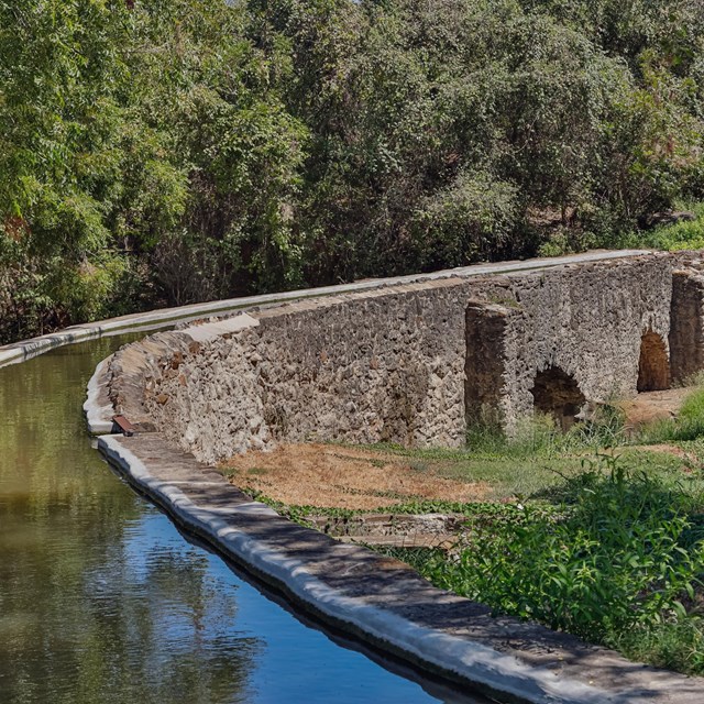 Water in an irrigation channel in a stone aqueduct