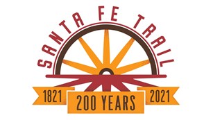 A graphic logo of a wagon wheel with the words Santa Fe Trail 200 years.