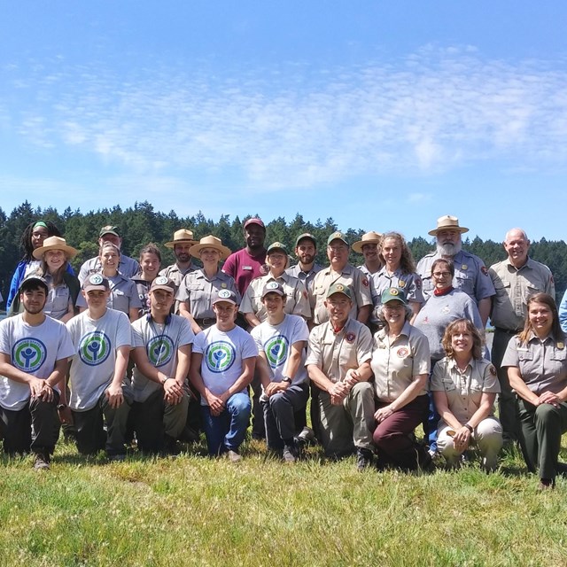 2017 park staff, interns, and volunteers pose for a photo.