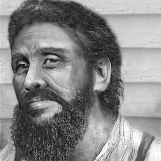 Black and white reconstructed image of a bearded man
